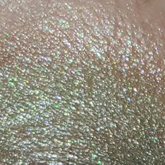 Side view of Frienda Eye Shadow palette showing gradient of matte and shimmer shades in warm bronze tones