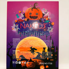 Side view of Halloween eye shadow palette showing stacked vibrant pans in orange, black, and purple shades