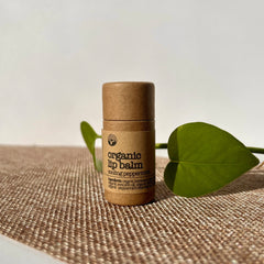 Lip balm tube, brown paper, green leaf, KAAZY organic lip balm text