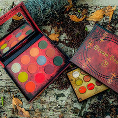 Open Dream Demon Eyeshadow Palette displaying 12 vibrant matte and shimmer shades in a sleek black case