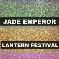 Side view of shimmery gold eyeshadow pan catching light with festive lantern festival packaging details