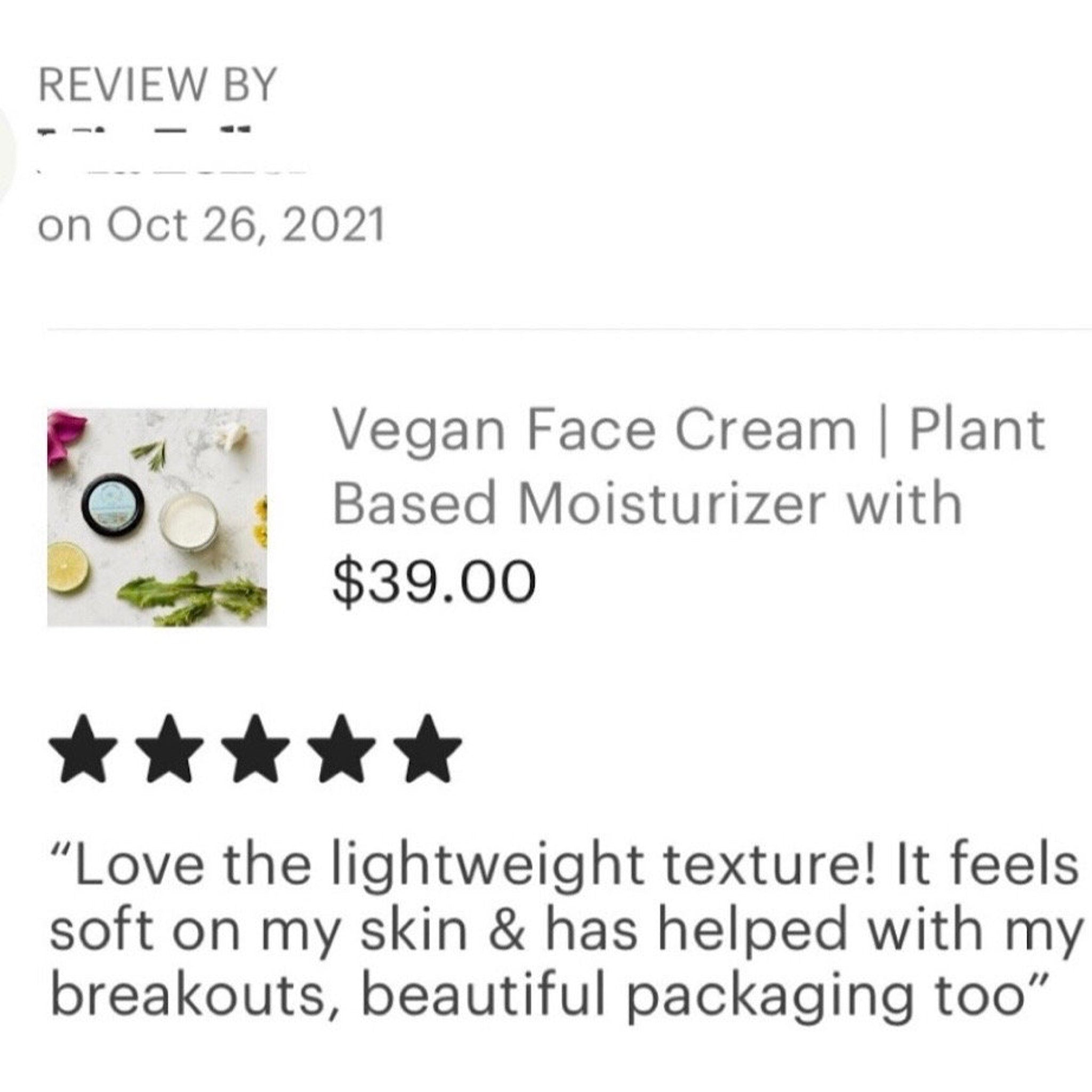 Side view of white minimalist jar with botanical vegan face cream, showcasing lightweight texture and essential oil blend