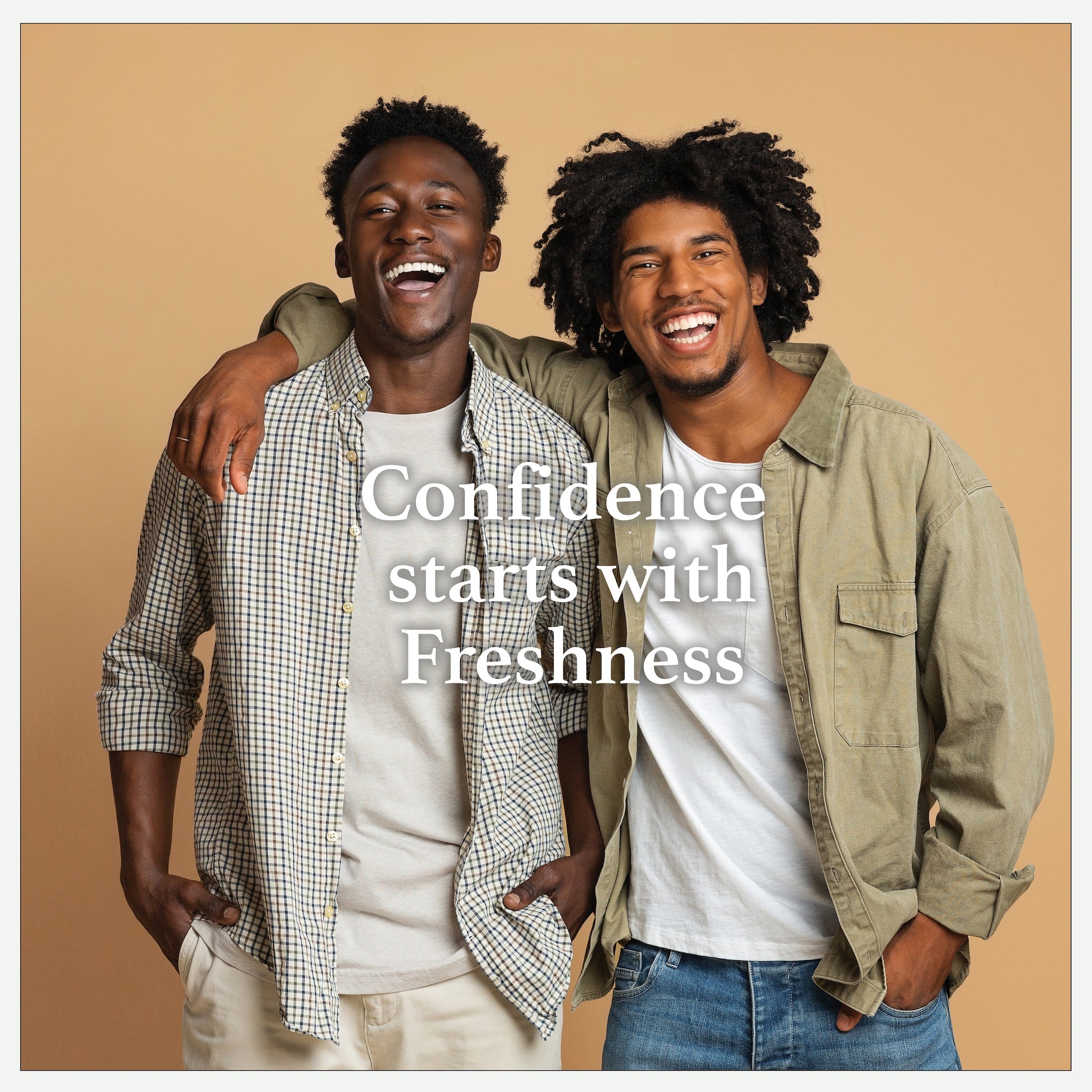 Two men smiling, wearing plaid shirt, olive green jacket, and white t-shirt, Confidence starts with Freshness text