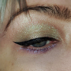 Close-up of Frienda Eye Shadow palette showing vibrant matte and shimmer shades in compact case