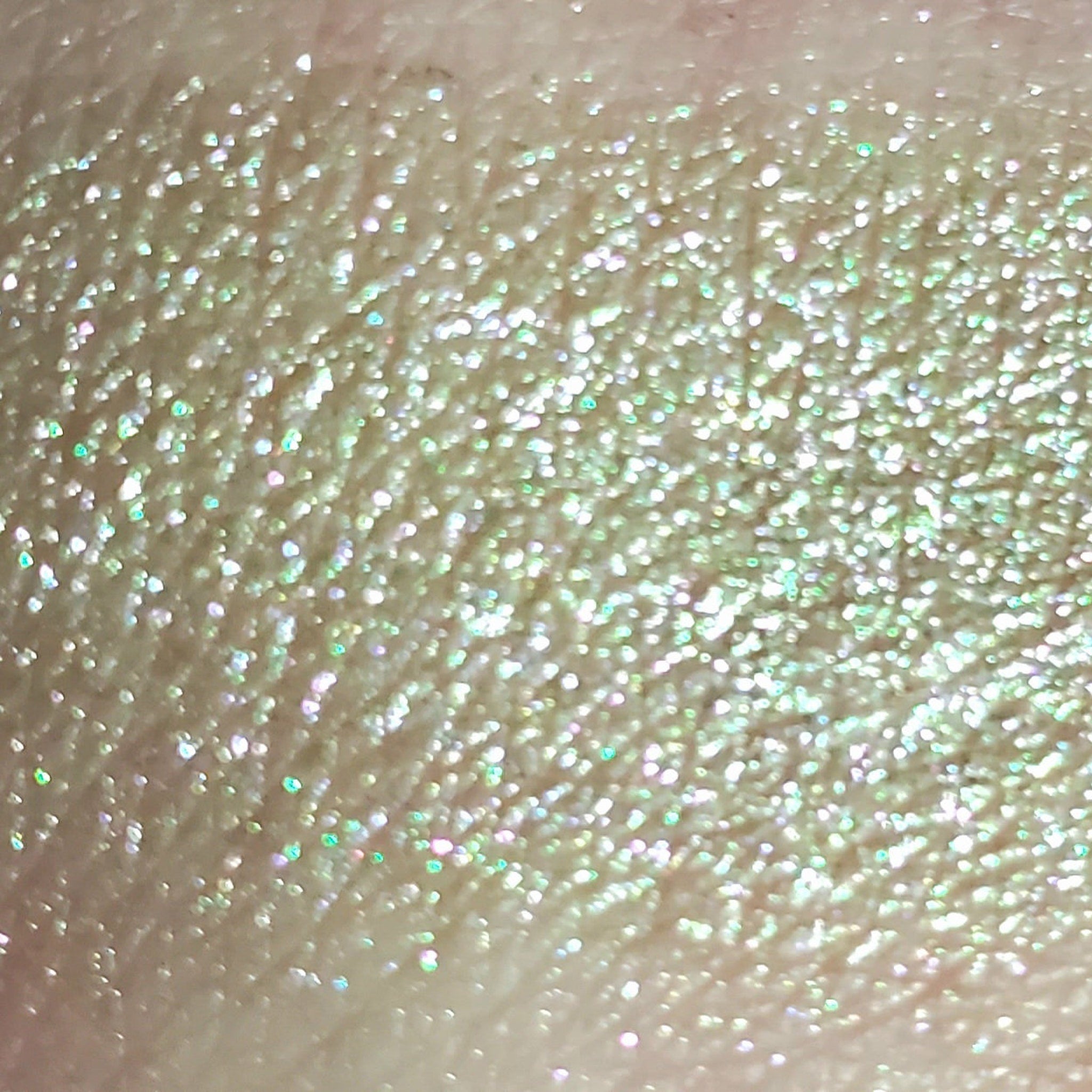 Front view of Frienda Eye Shadow palette showcasing vibrant matte and shimmer shades in sleek black compact.
