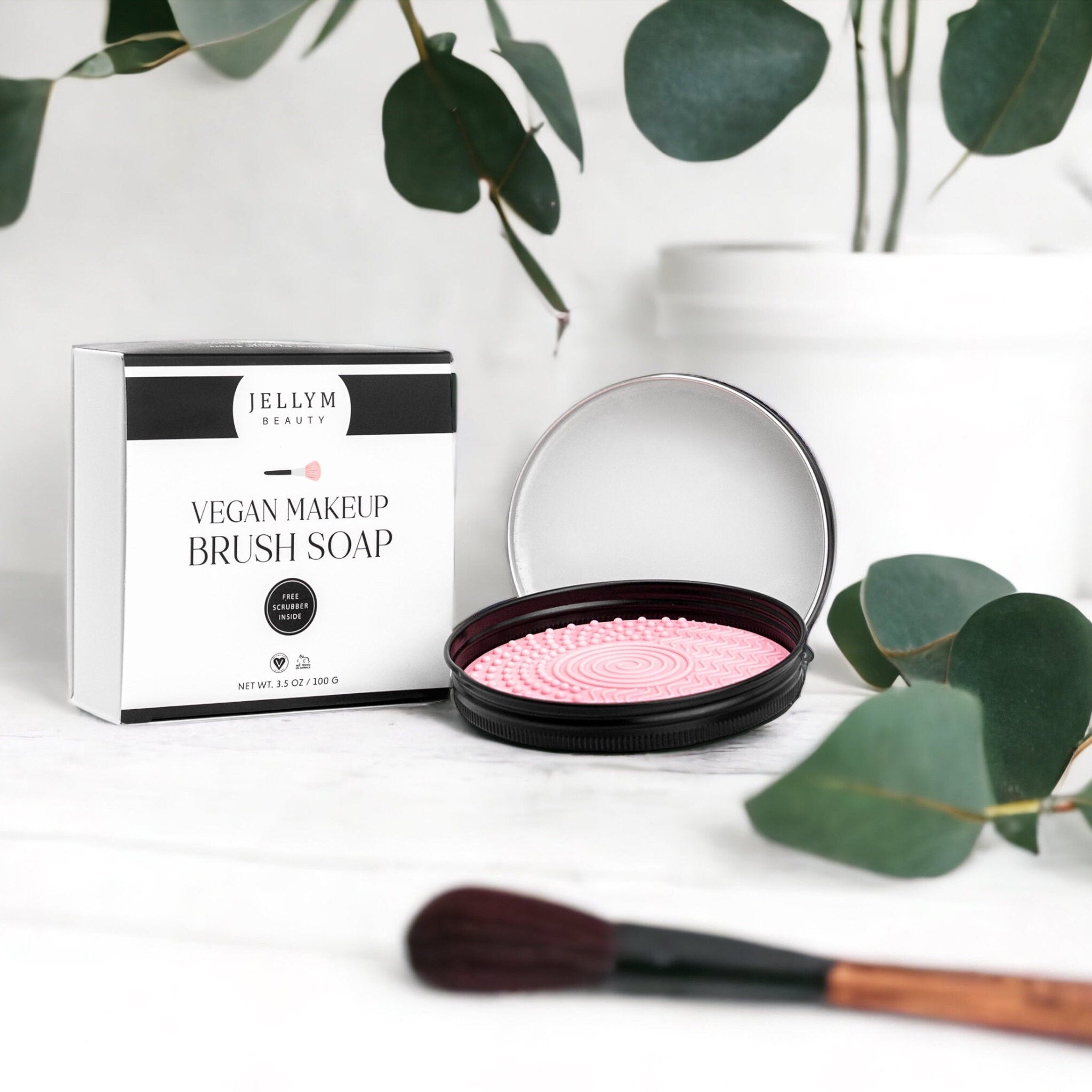 Close-up of vegan soap bar with textured surface and free scrubber for cleaning makeup brushes and sponges