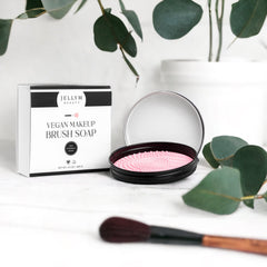 Close-up of vegan soap bar with textured surface and free scrubber for cleaning makeup brushes and sponges