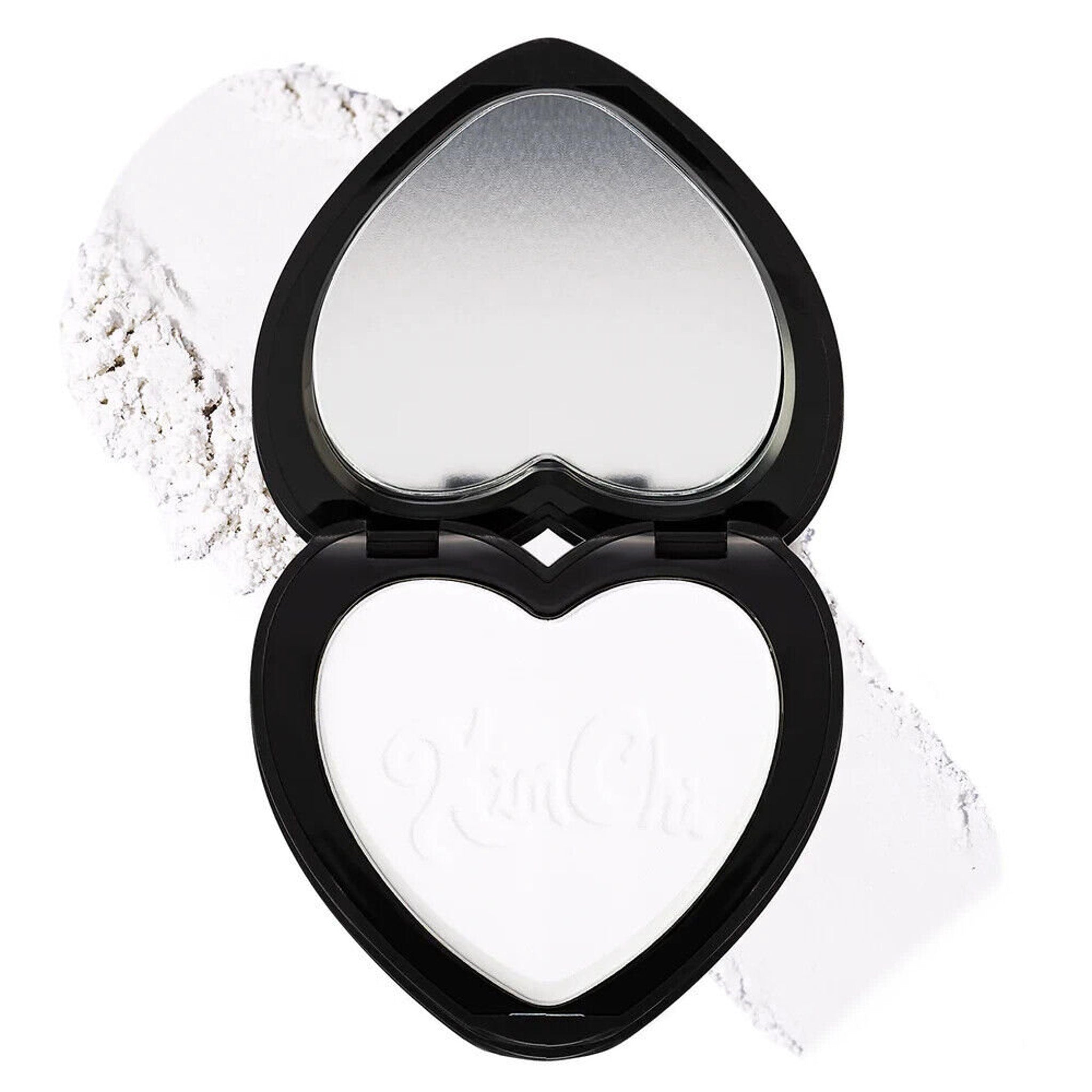 Powder compact with black case, white powder, and heart shape with KimChi text visible