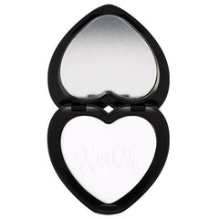 Heart-shaped compact with black frame, mirror, and white powder with Kim Chi text