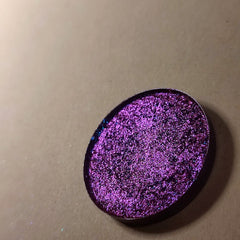 Close-up of Berys Eye Shadow palette showing shimmering bronze and taupe shades with smooth, blendable texture
