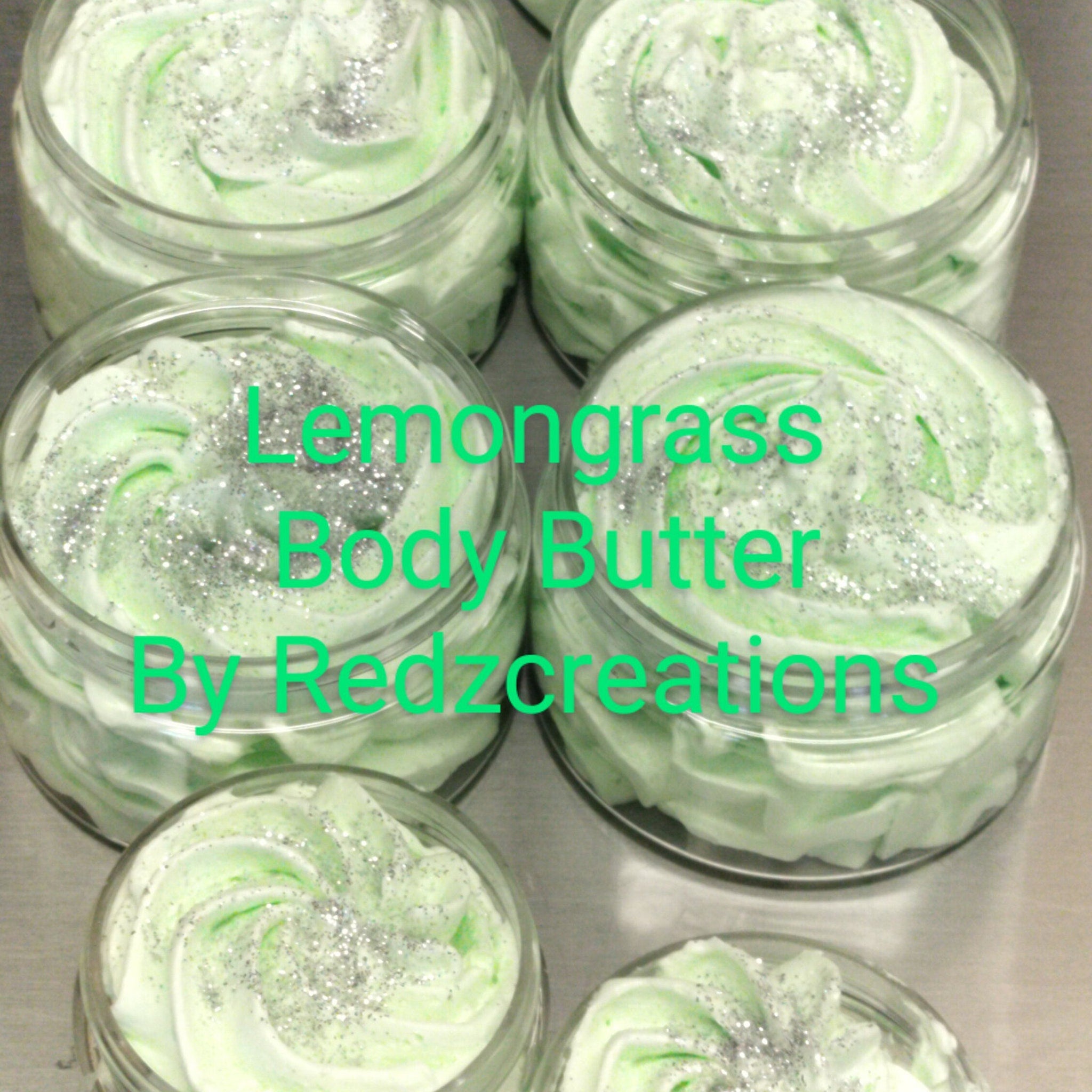 Close-up of whipped shea butter moisturizer in a white jar with creamy texture and natural ingredients visible