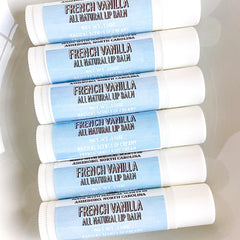 Lip balms with white tubes and blue labels, Salted Mule French Vanilla flavor