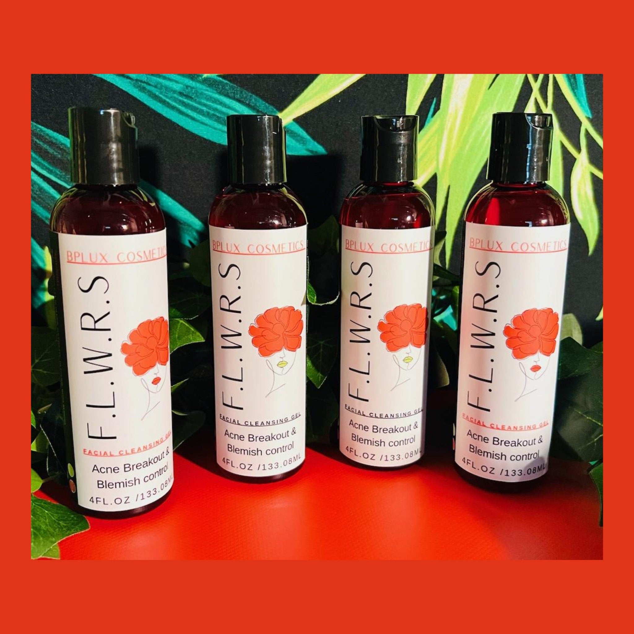 Facial cleanser bottles with black caps, white labels, and F,L,W,R,S brand name