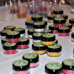 Vibrant Dollipop eyeshadow sampler pack with six matte and shimmer shades in a sleek black compact.