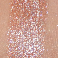 Close-up of Noisette mineral eye shadow in round compact with soft matte finish and warm taupe hue