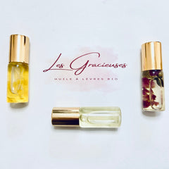 Lip oil bottles with gold caps, clear glass, and visible Les Gracieuses Organic text