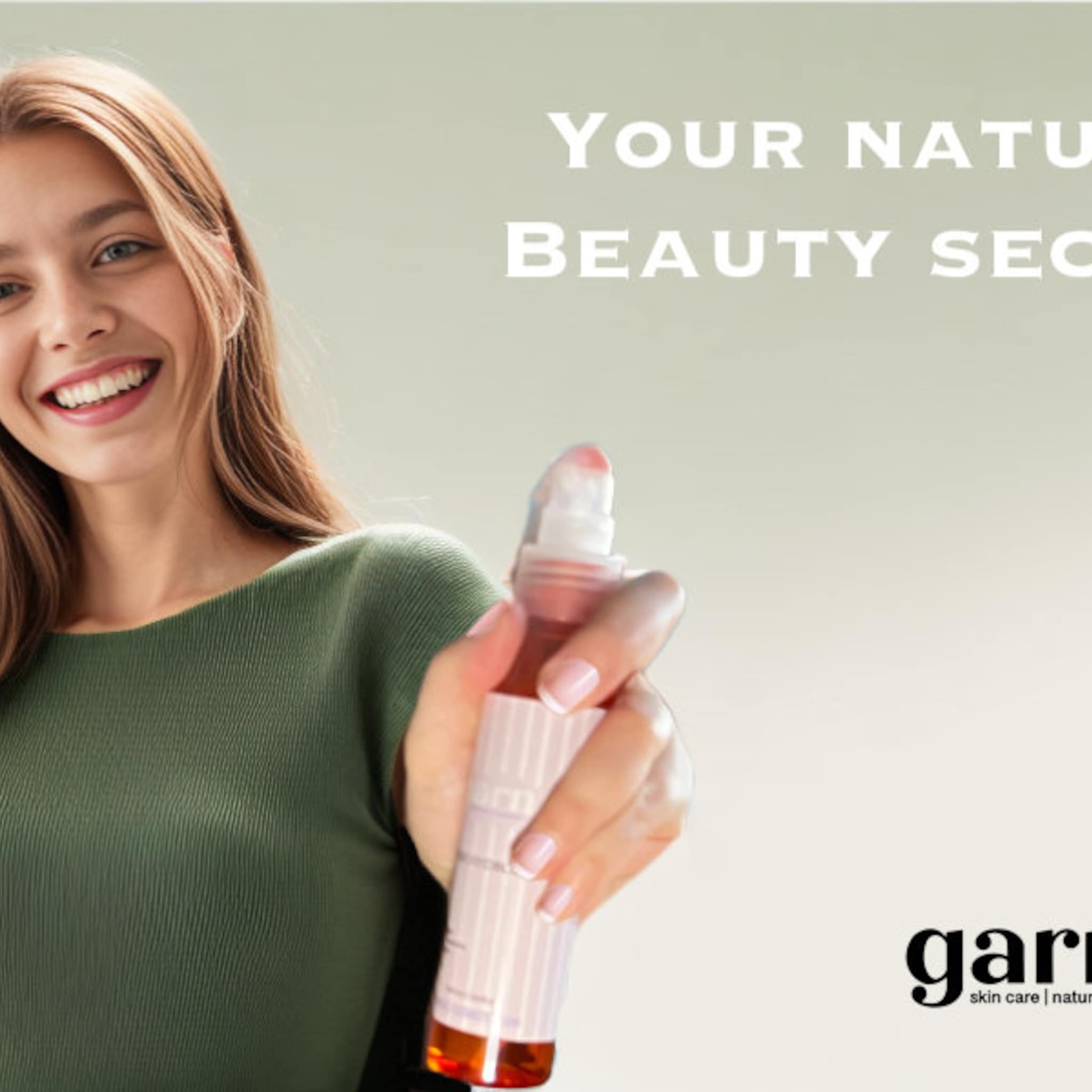 Skin care product bottle, pink and white striped, held by woman in green shirt, Garnier logo visible