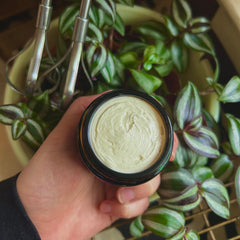 Golden jar of Wagyu tallow body butter with rich, creamy texture and minimalist luxury packaging
