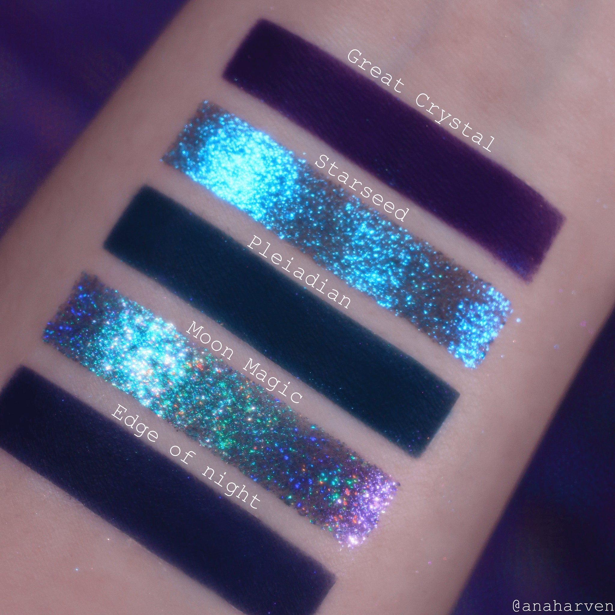 Side view of Lands of Enchantment palette showing holographic eyeshadows catching light at an angle