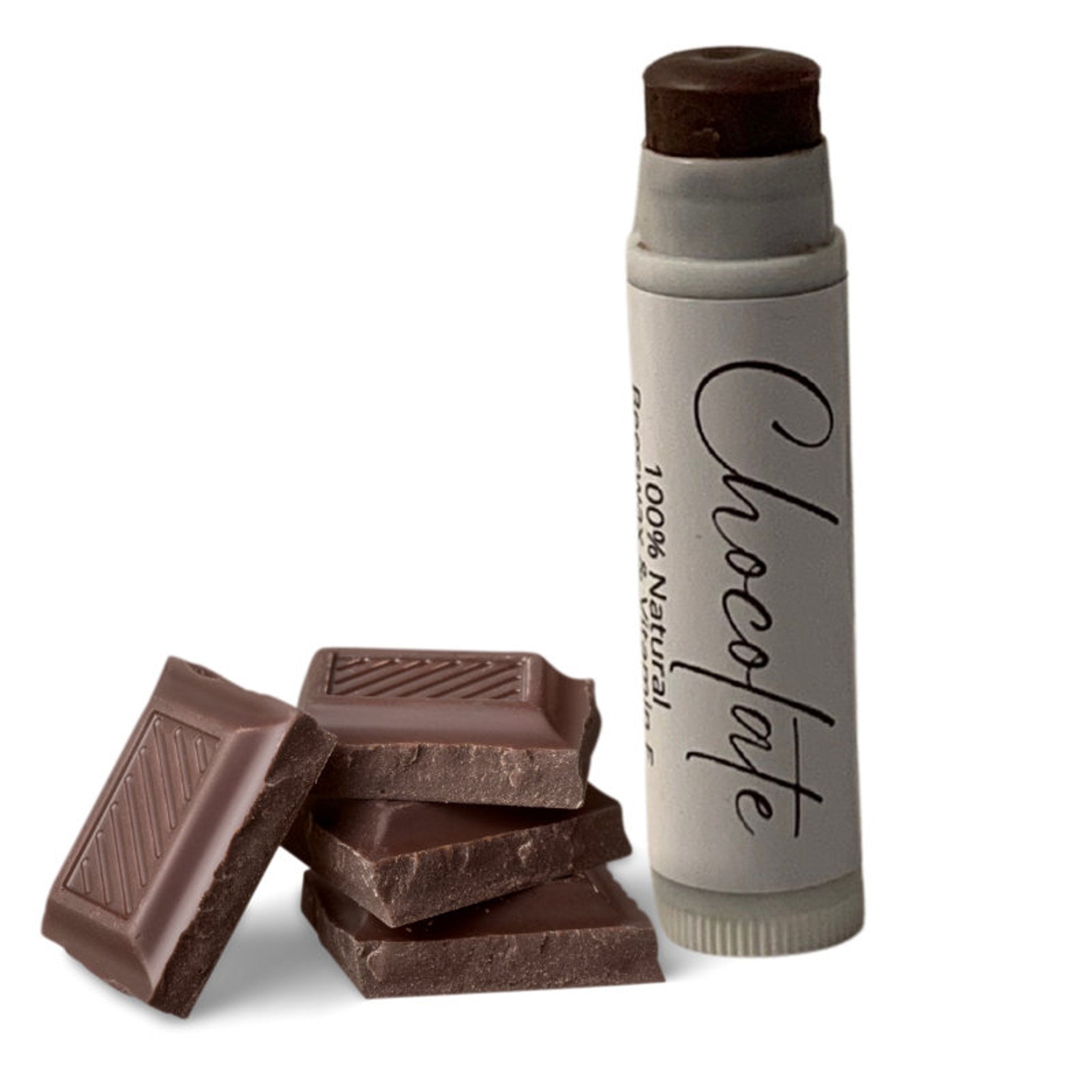 Lip balm with dark brown color, gray tube, and "Chocolate" text, with chocolate pieces