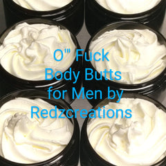 Side angle of white whipped shea butter moisturizer in a sleek jar with gold lid, showcasing rich texture