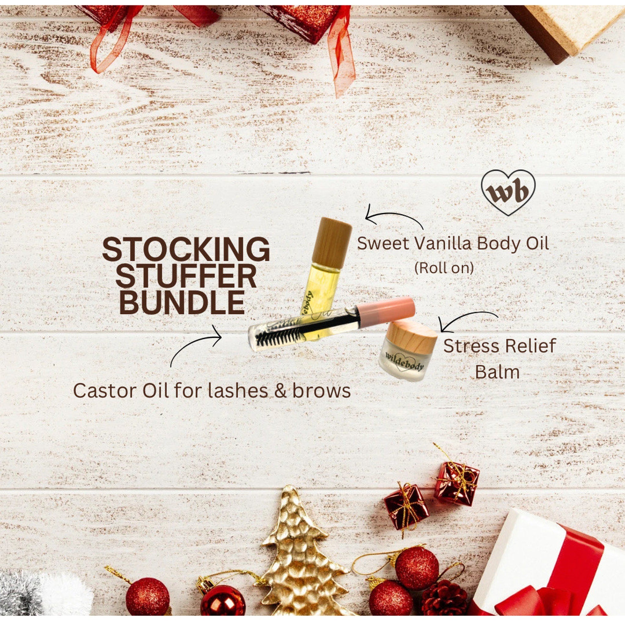 Body balm set with wooden lids, clear bottles, and Wildebody logo on white wood background