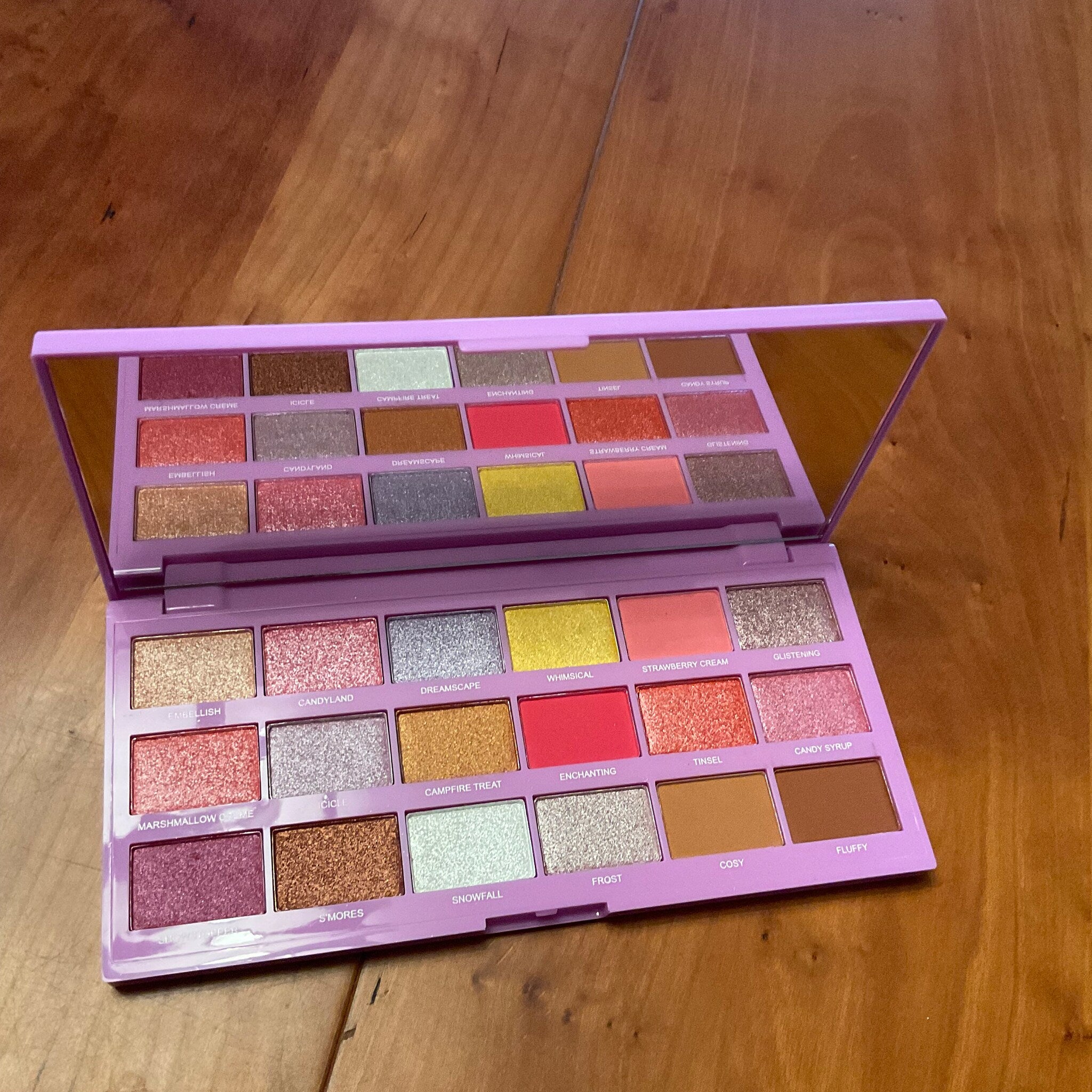 Front view of I Heart Revolution Marshmallow Wonderland palette showing pastel eyeshadow shades in rectangular pans