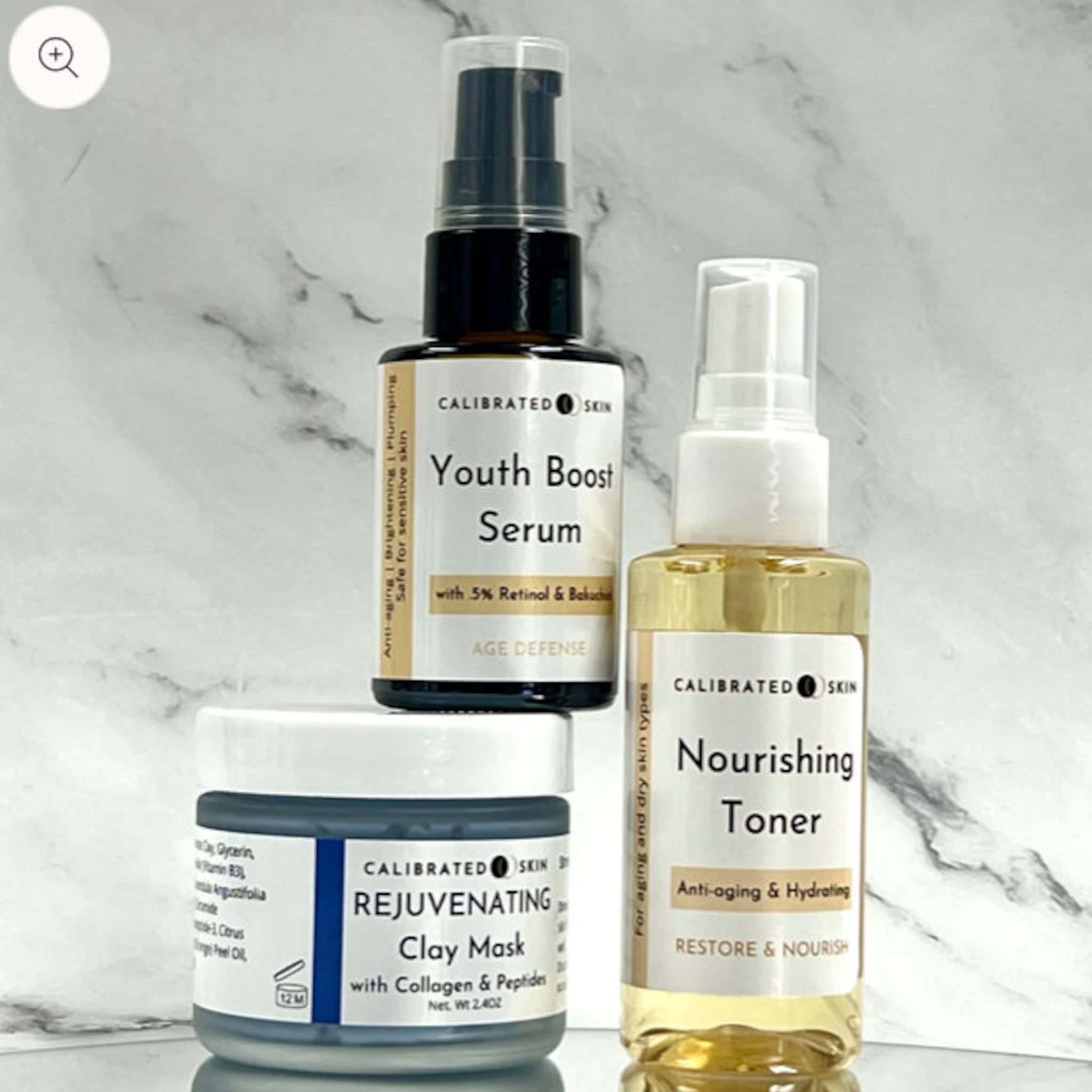Skincare products featuring black, clear, and white bottles with CALIBRATED SKIN branding