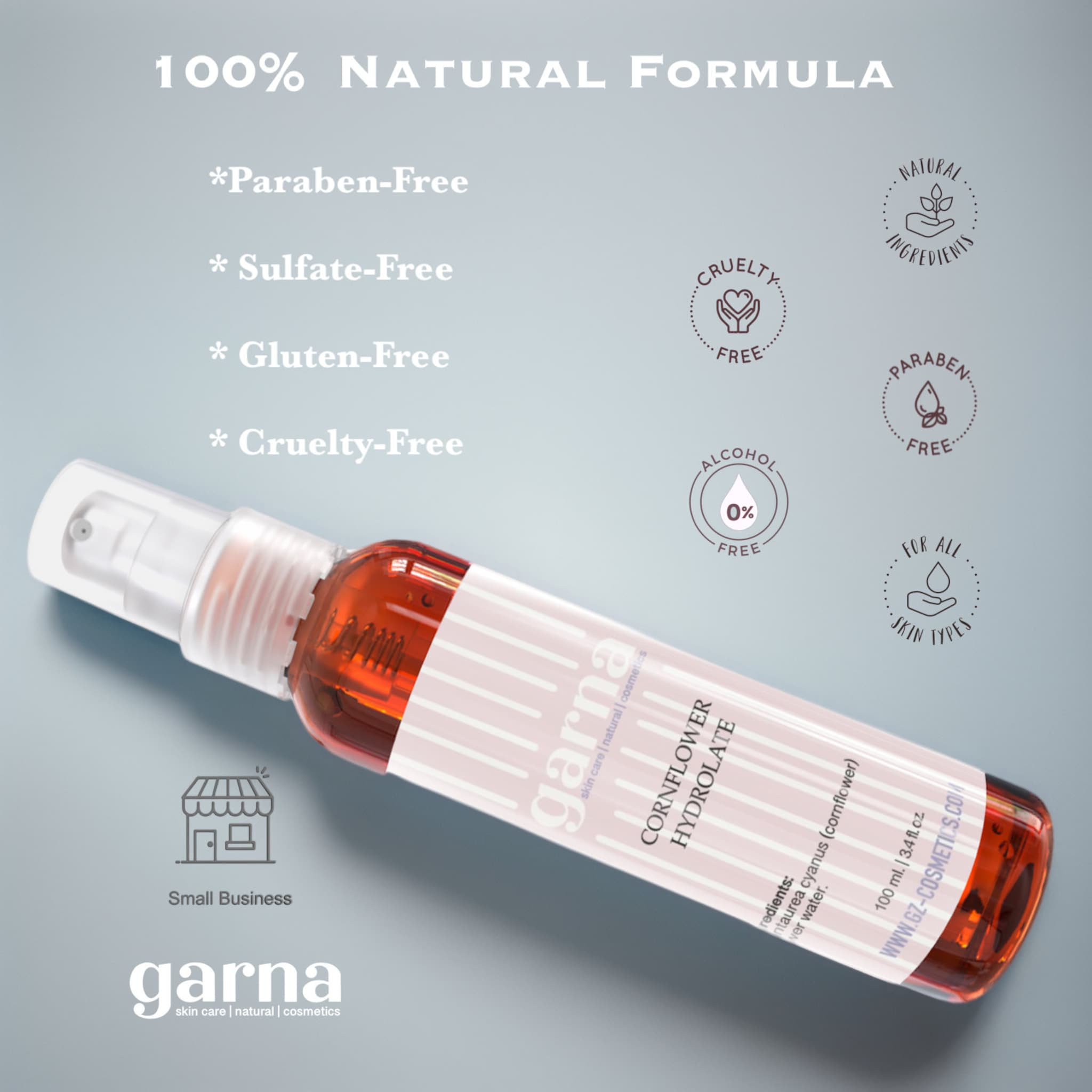 Cornflower Hydrolate bottle, clear glass, brown liquid, white label with text for skin care