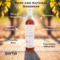 Grape Hydrolate bottle, clear glass, brown liquid, with garna branding and spray top