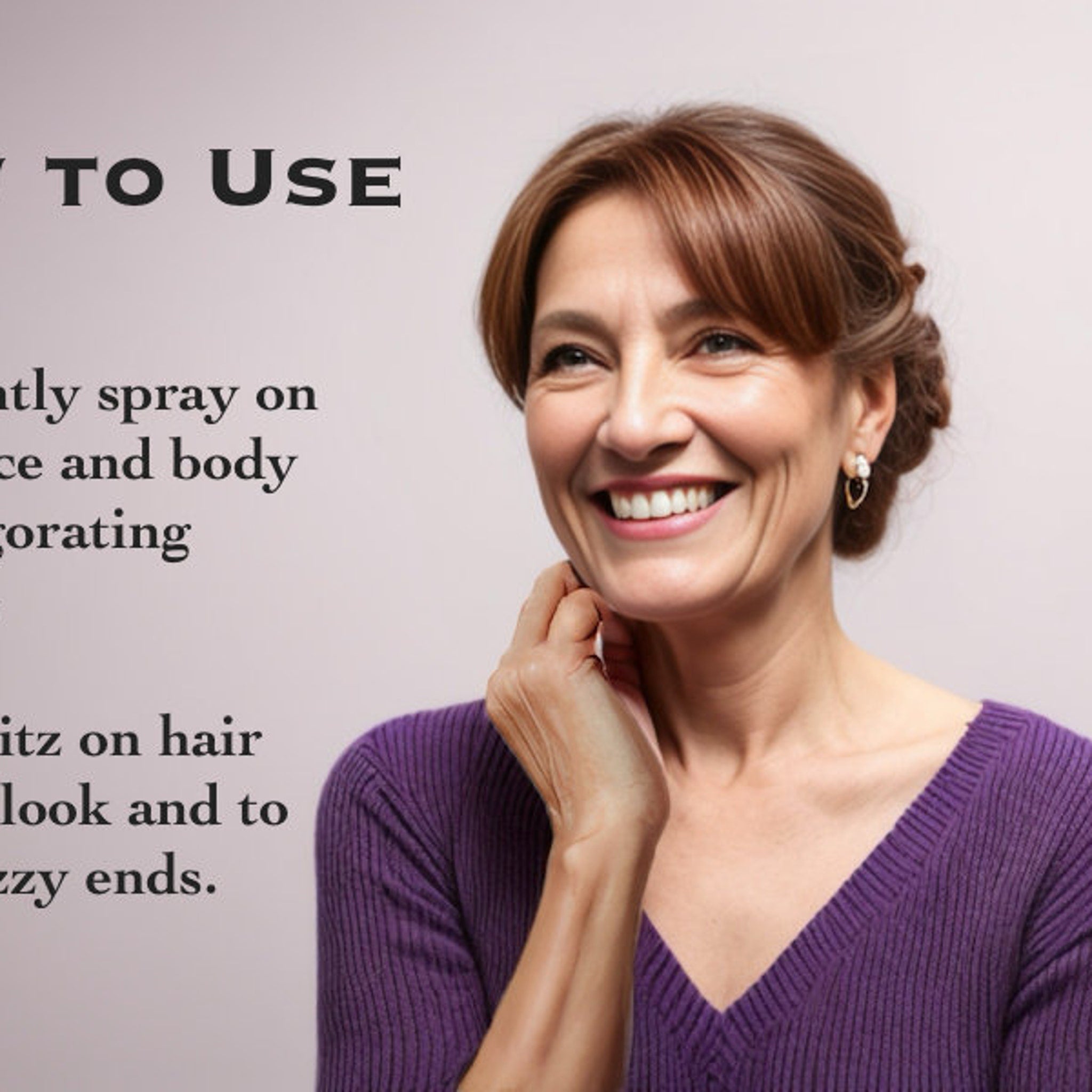Woman smiling with auburn hair, purple V-neck sweater, and gold earrings, demonstrating product use