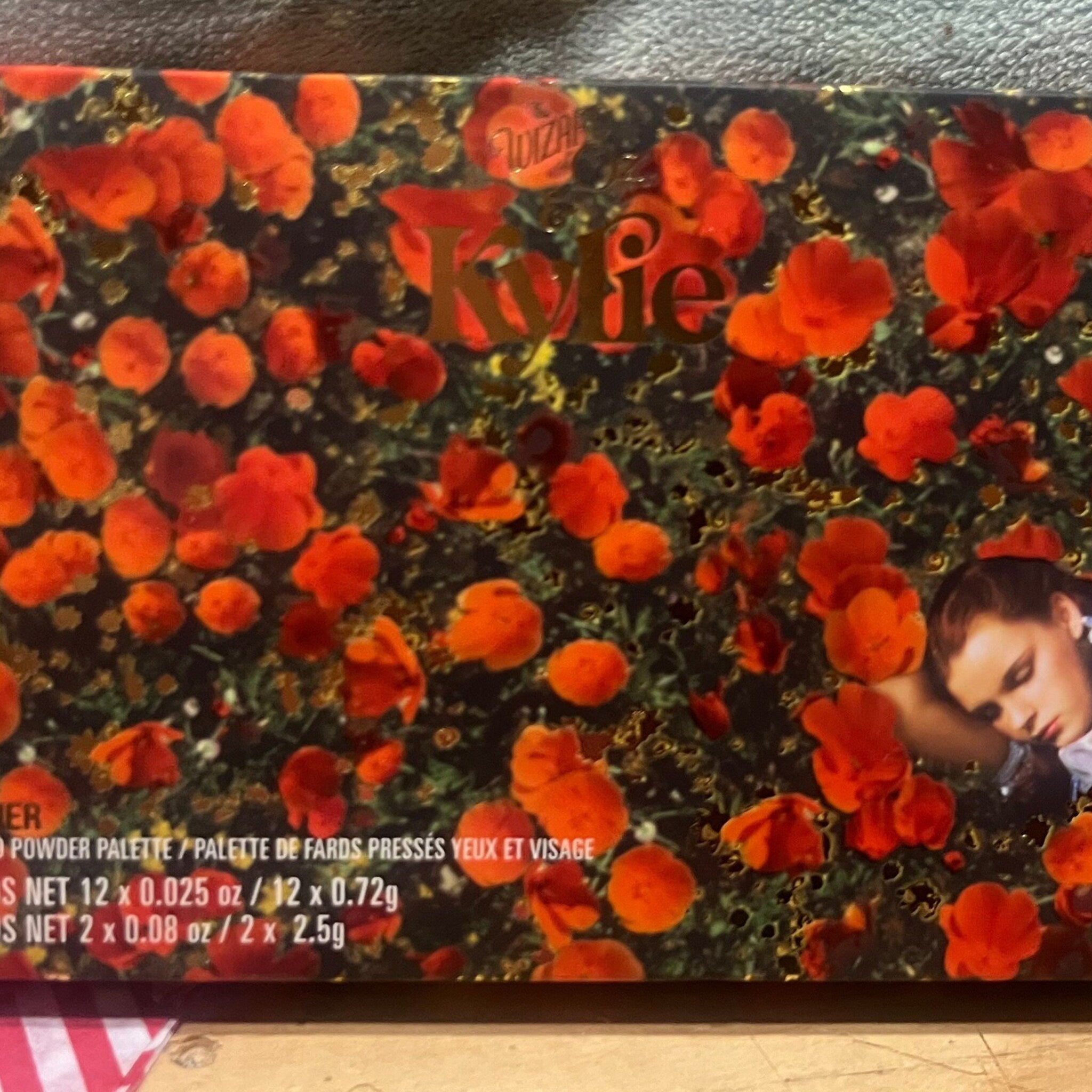 Eye makeup palette with orange floral pattern and Kylie Cosmetics logo