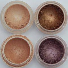 Close-up of Mineral Eyeshadow in Fancy Girl Collection showing vibrant pressed powder palette with shimmer finish