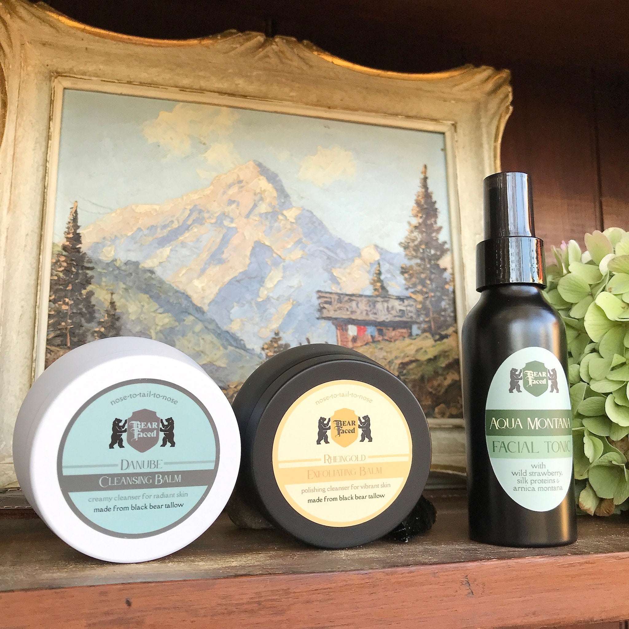 Facial skincare products with white, black, and green labels, BEAR FACED brand name visible on shelf