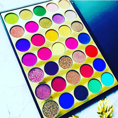 Royal Eyeshadow Palette with shimmering jewel-toned shades in a sleek black compact case