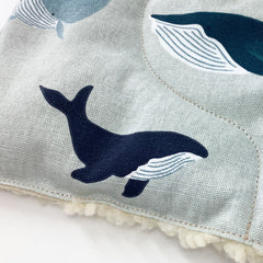 Whale pattern fabric, blue and white whale design, light blue textile with white fleece trim