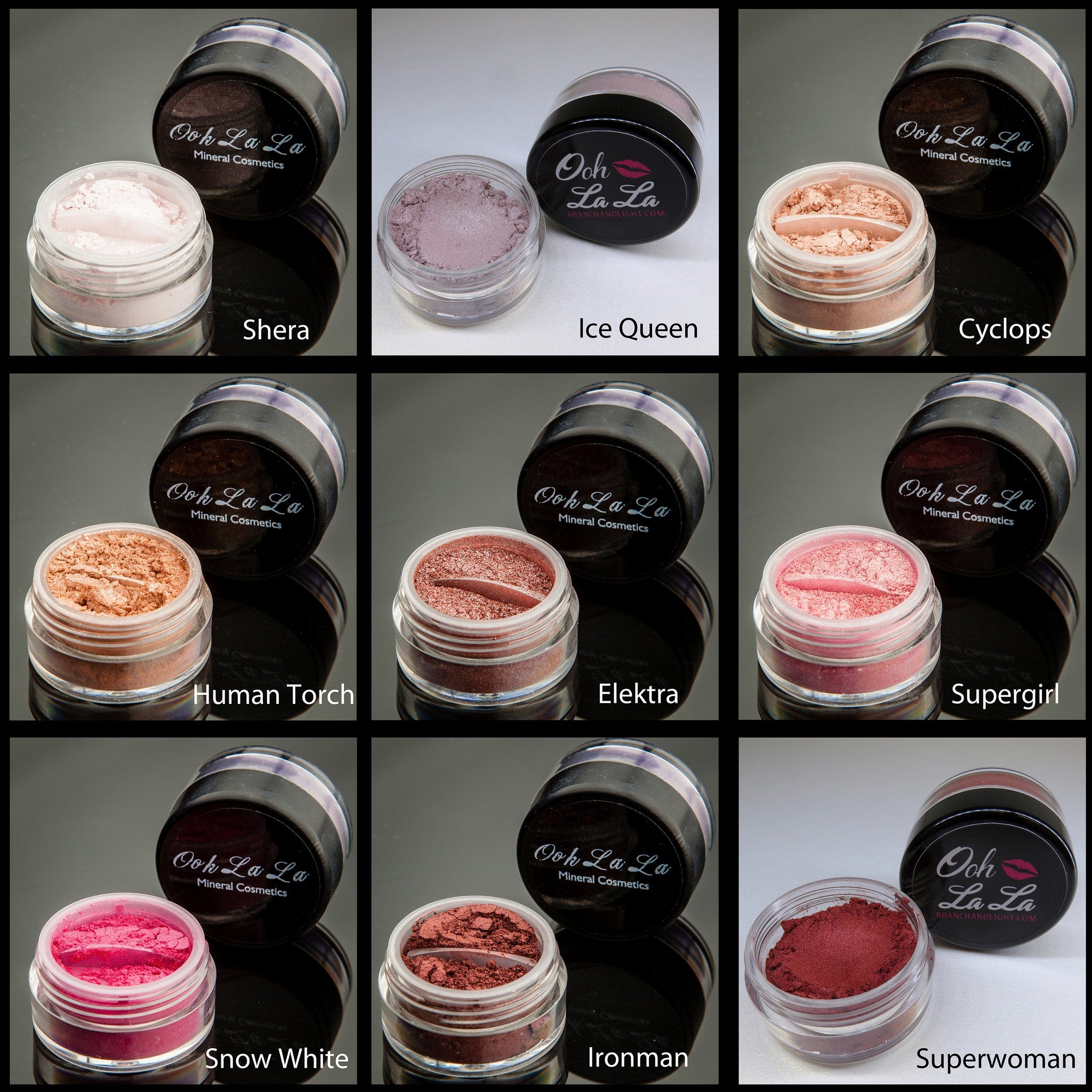 Small glass jar of mineral eye shadow with black screw-top lid and silver label on marble surface