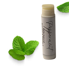Peppermint lip balm in a gray tube with green mint leaves, Veda Essential Canada brand