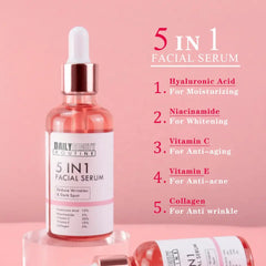 Close-up of golden vitamin C serum droplets on fingertips with luminous glow against neutral backdrop