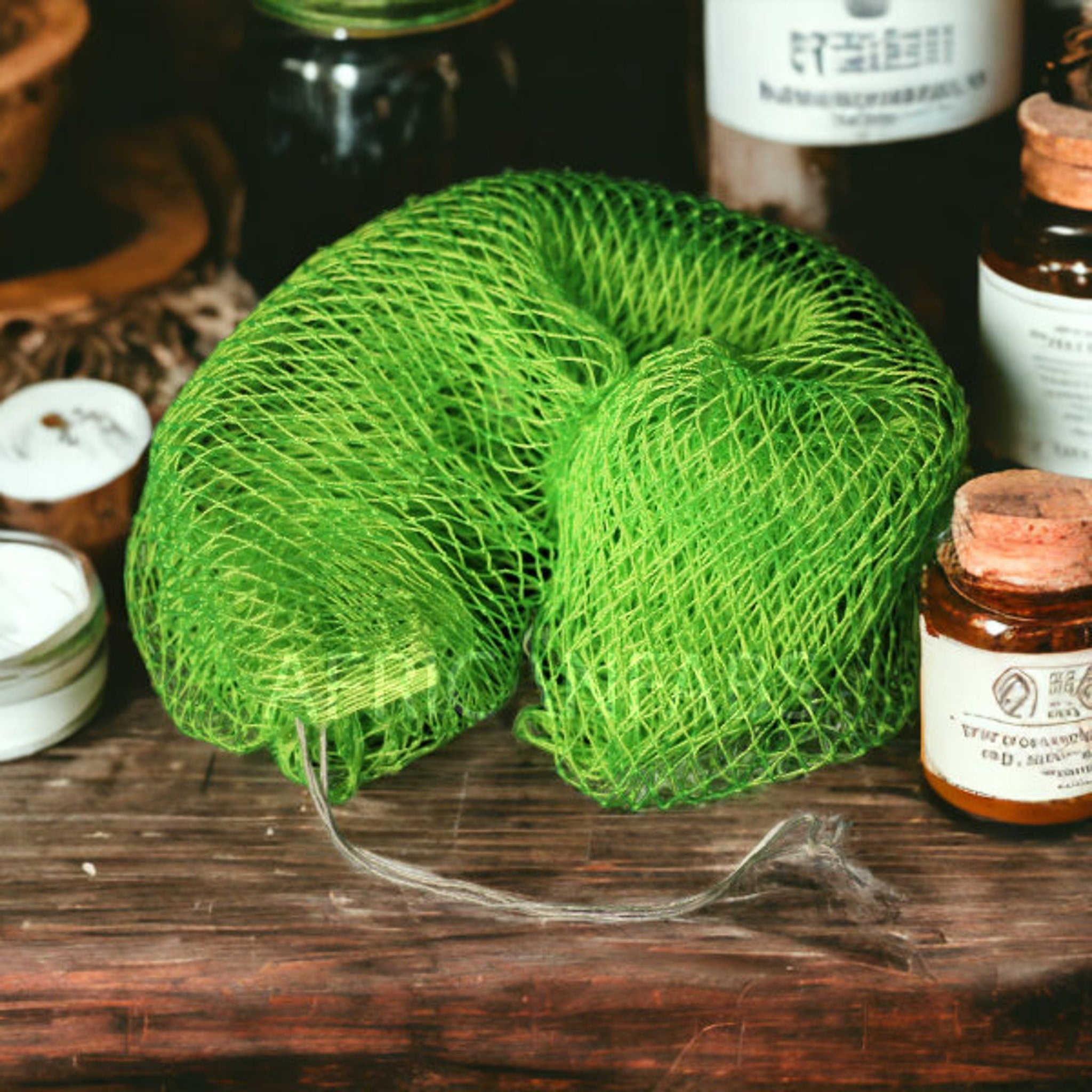 Close-up of textured African exfoliating net sponge with woven fibers against neutral backdrop, highlighting intricate weave pattern