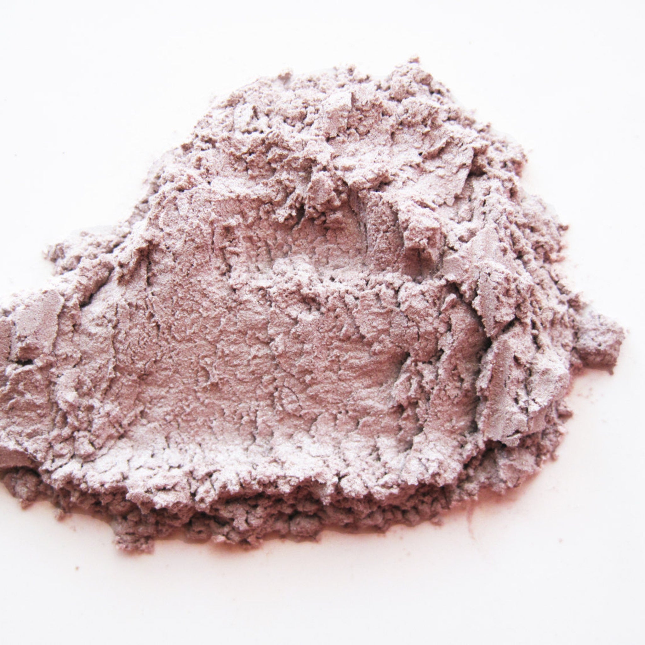 Close-up of Pure & Natural Grace Eye Shadow palette showing matte and shimmer earthy-toned powders in circular pans