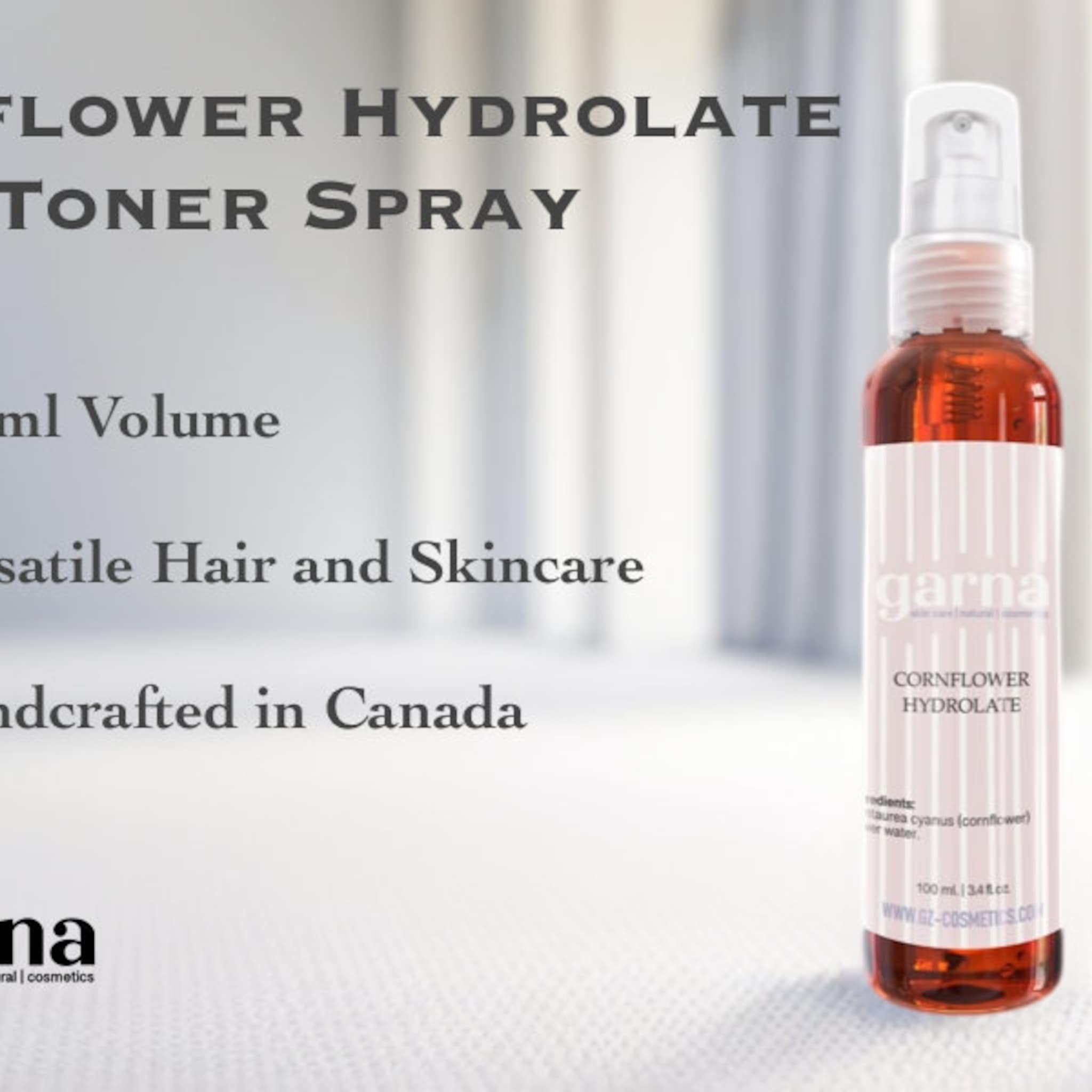 Toner spray bottle, amber liquid, white label with pink stripes, garna brand visible