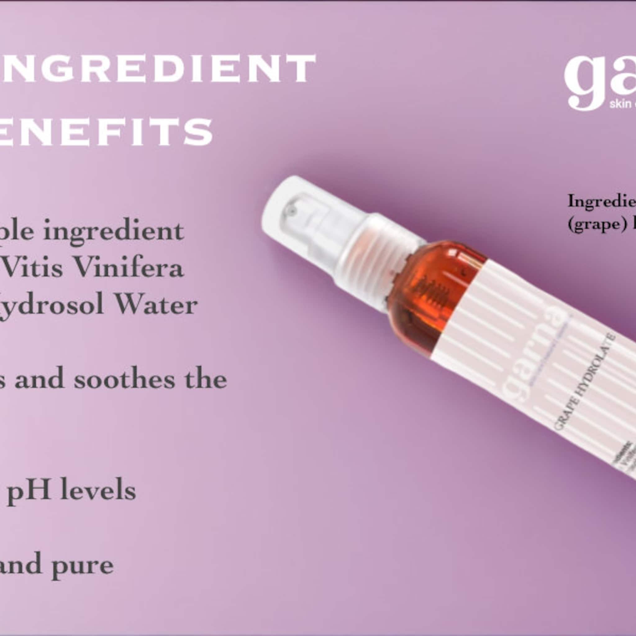Grape Hydrolate spray bottle, clear pump, brown liquid, white label, garna brand visible
