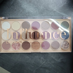 Detailed close-up of DDonna Influence 21-Color Eyeshadow Palette