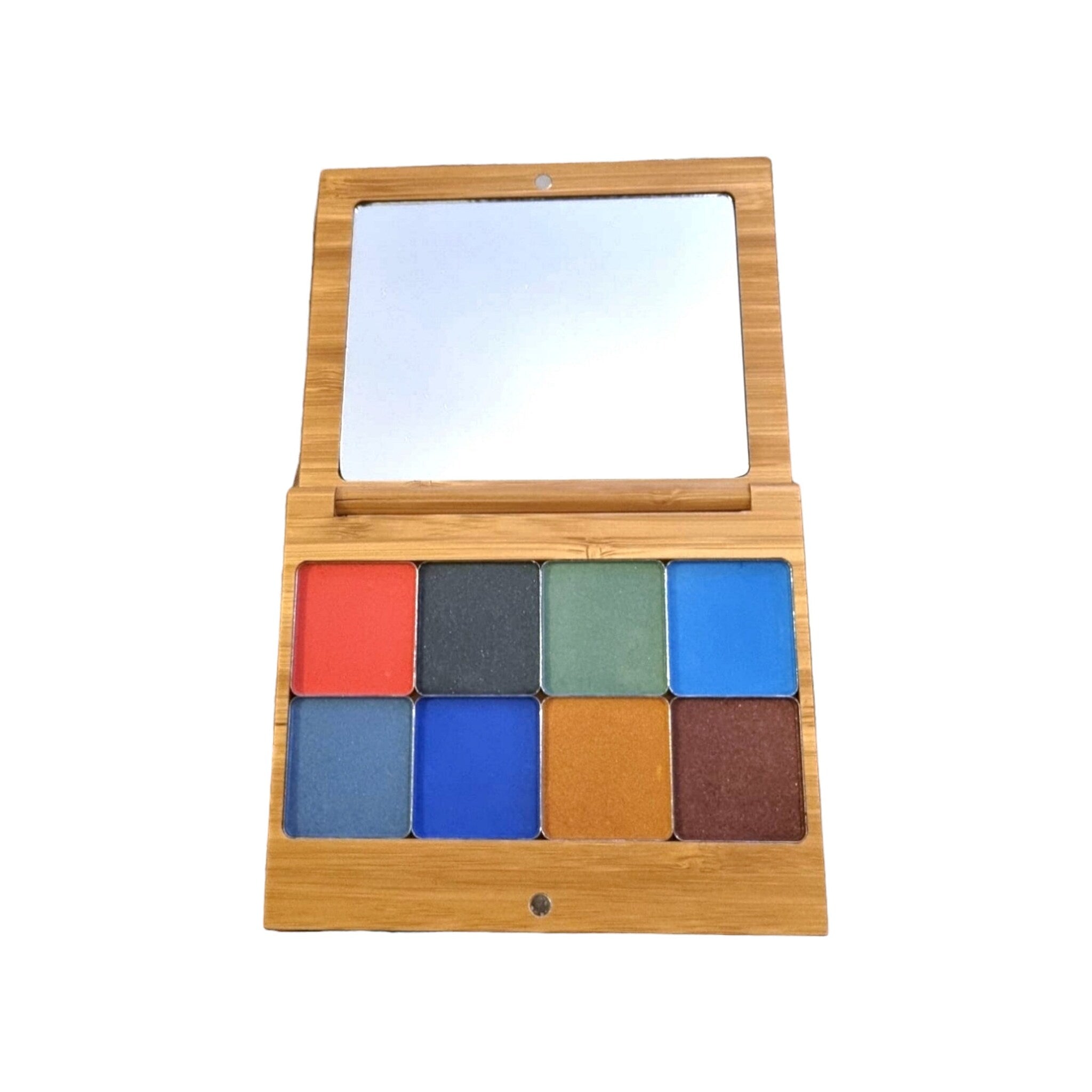 Vegan Autumn Flower eyeshadow palette displayed open, showing warm terracotta and gold shades in floral-embossed packaging
