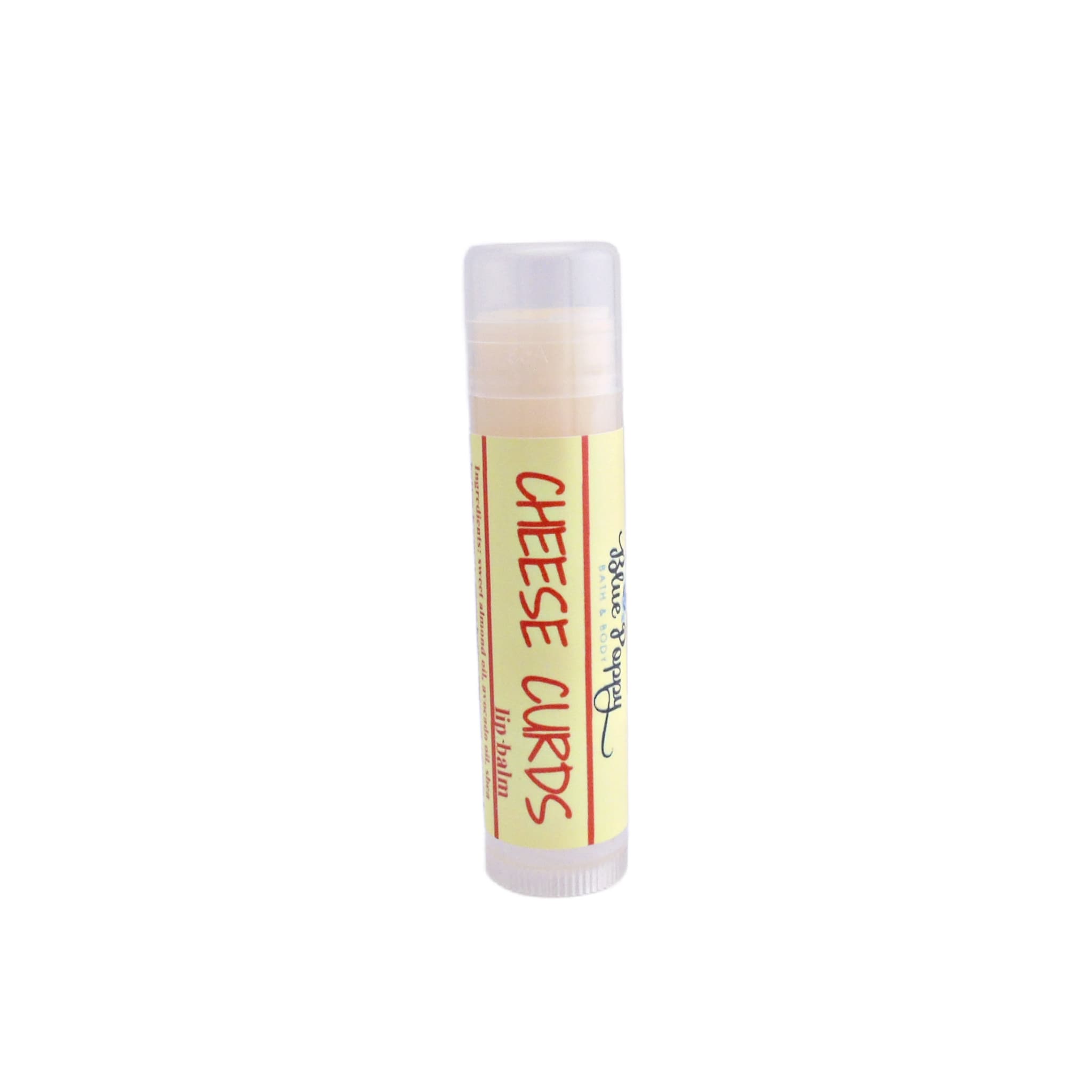 Lip balm with yellow label and "CHEESE CURDS" text, clear cap, by Blue Poppy Bath & Body
