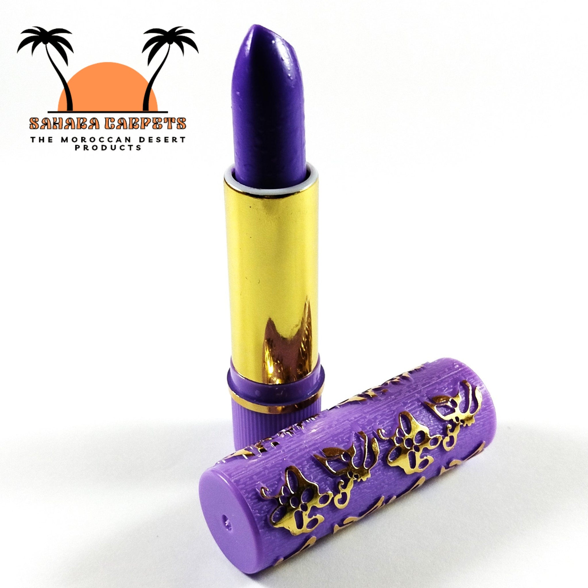 Purple lipstick with gold tube and decorative casing, Sahara Carpets brand