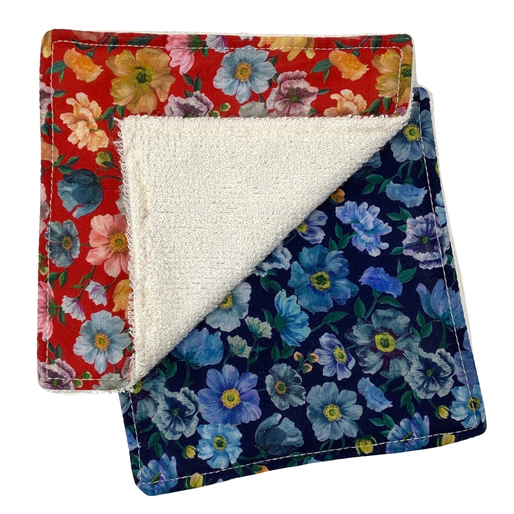 Floral patterned washcloths with red and navy floral print and white terrycloth center