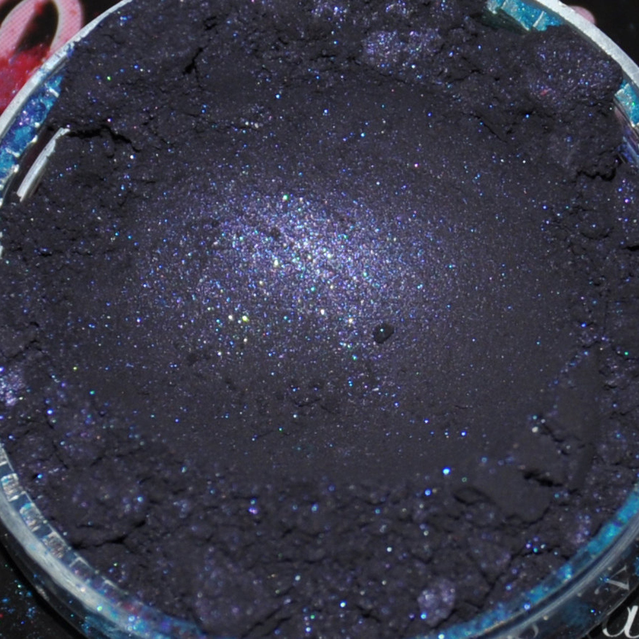 Detailed close-up of Pigmented Mineral Eye Shadow Jar - Nevermore 3g with Sifter