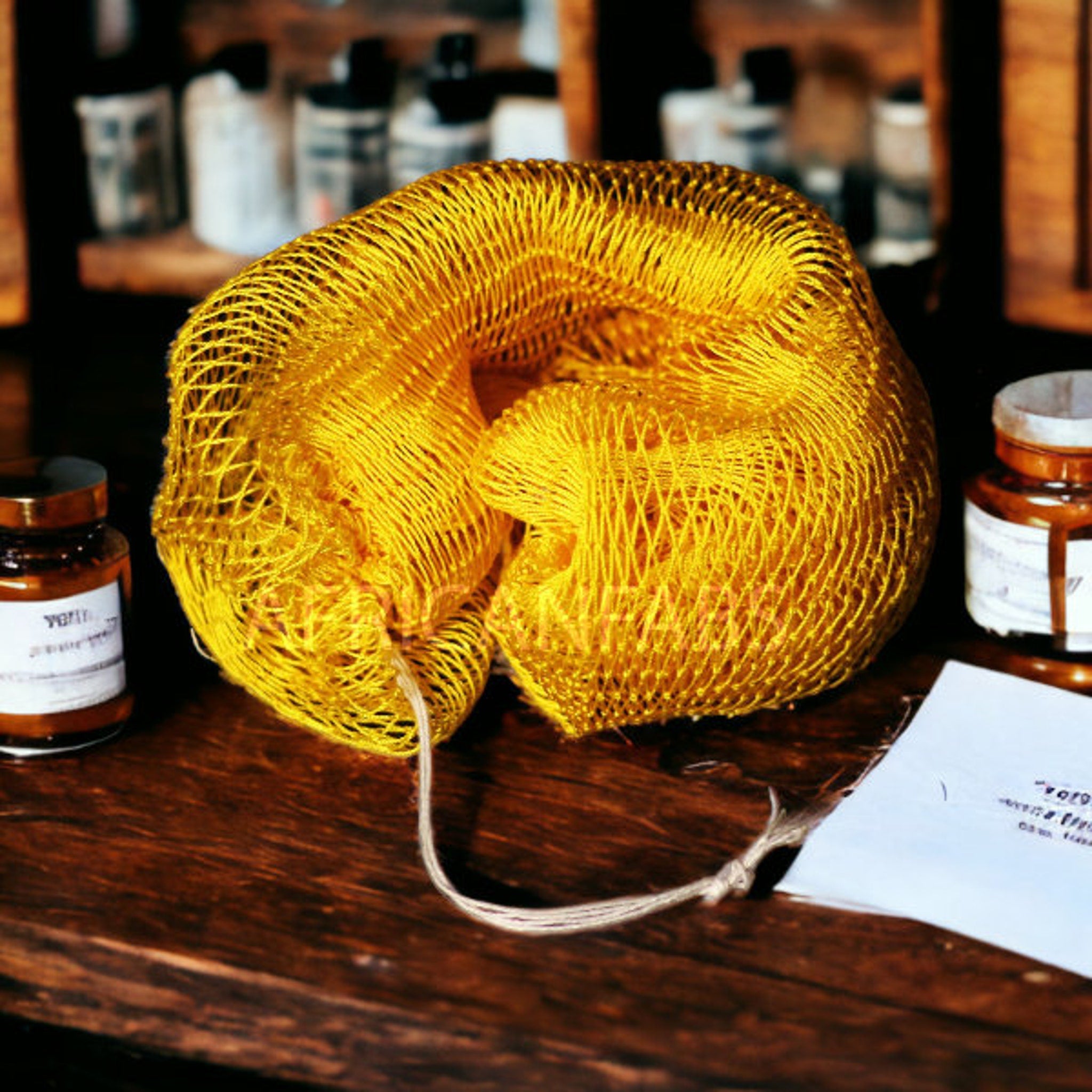 Close-up of textured African exfoliating net sponge with woven fibers for deep skin renewal and back acne treatment